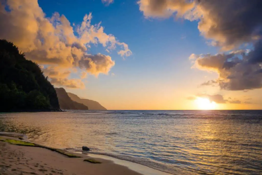 Kauai Sunset of the Na Pali coast from Ke'e Beach in Kauai, Hawaii